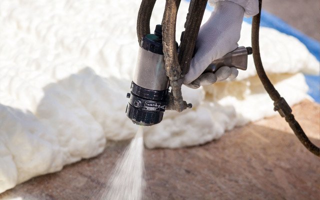 Close-up of spray foam insulation being applied